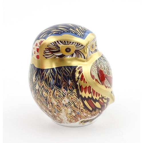118 - A Royal Crown Derby paperweight modelled as a Little Owl. Boxed. Approx. 3 1/4