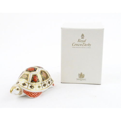 120 - A Royal Crown Derby paperweight modelled as a Turtle. Boxed. Approx. 4 1/2