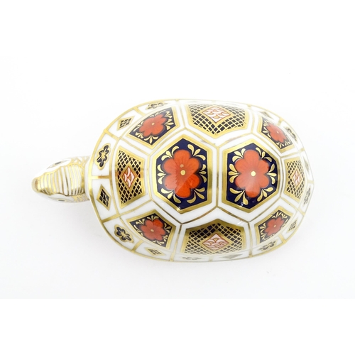 120 - A Royal Crown Derby paperweight modelled as a Turtle. Boxed. Approx. 4 1/2