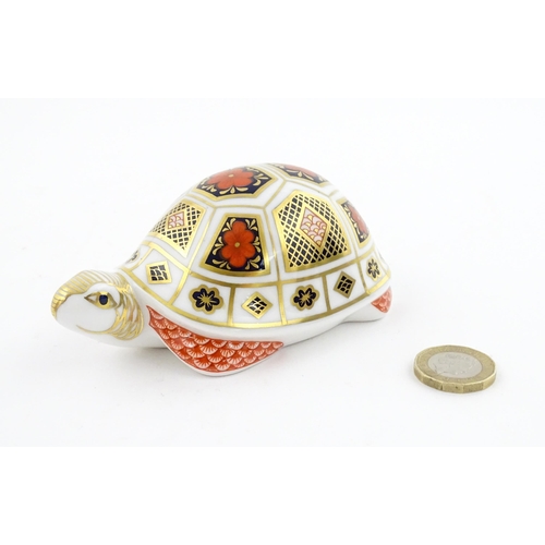 120 - A Royal Crown Derby paperweight modelled as a Turtle. Boxed. Approx. 4 1/2