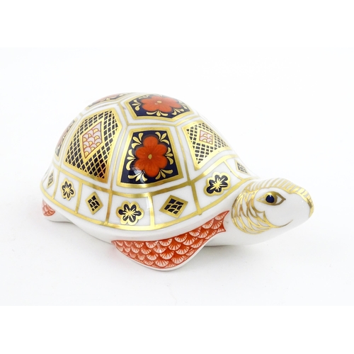 120 - A Royal Crown Derby paperweight modelled as a Turtle. Boxed. Approx. 4 1/2