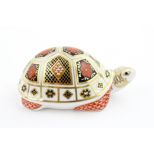 120 - A Royal Crown Derby paperweight modelled as a Turtle. Boxed. Approx. 4 1/2