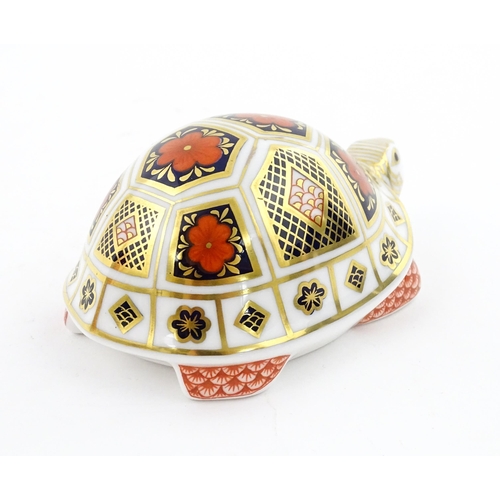 120 - A Royal Crown Derby paperweight modelled as a Turtle. Boxed. Approx. 4 1/2