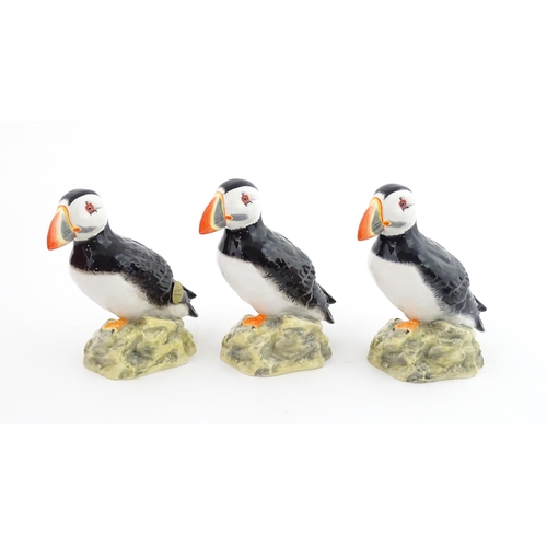 93 - Three John Beswick models of Puffins. Marked under. Approx. 4 1/4