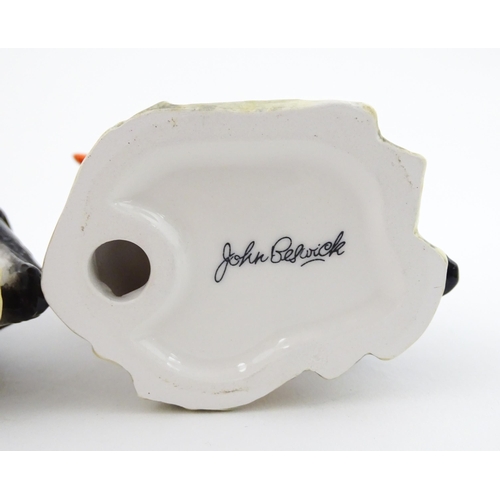 93 - Three John Beswick models of Puffins. Marked under. Approx. 4 1/4