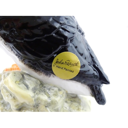 93 - Three John Beswick models of Puffins. Marked under. Approx. 4 1/4