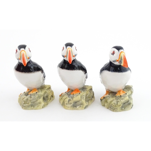 93 - Three John Beswick models of Puffins. Marked under. Approx. 4 1/4