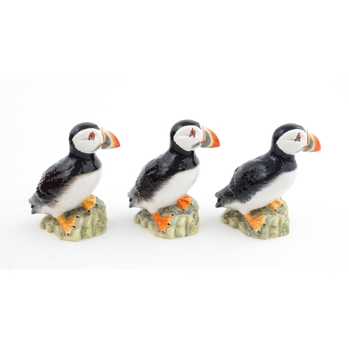 93 - Three John Beswick models of Puffins. Marked under. Approx. 4 1/4