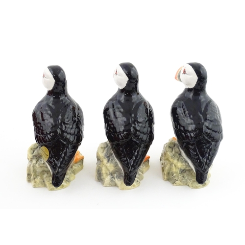 93 - Three John Beswick models of Puffins. Marked under. Approx. 4 1/4