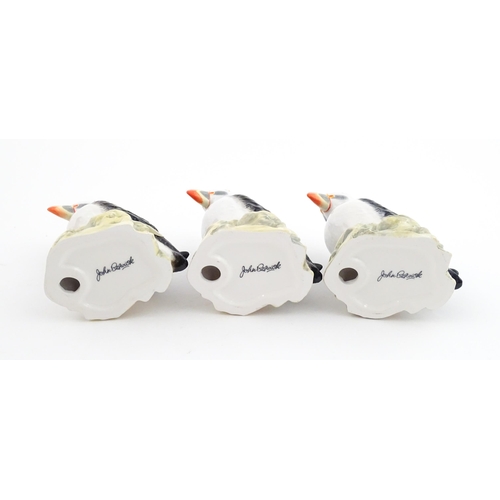 93 - Three John Beswick models of Puffins. Marked under. Approx. 4 1/4