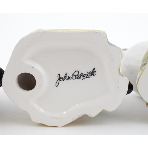 93 - Three John Beswick models of Puffins. Marked under. Approx. 4 1/4