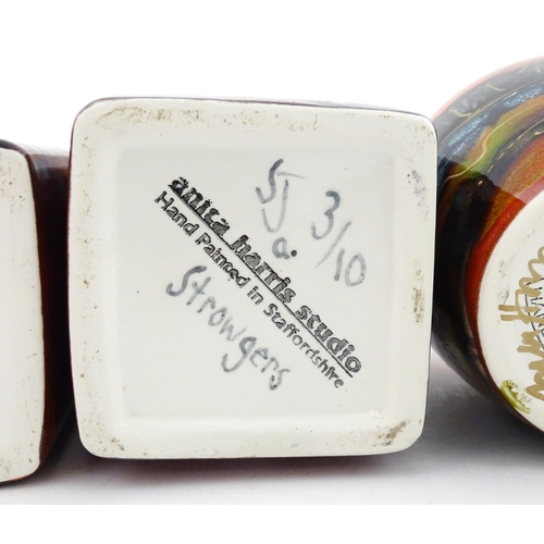 94 - Three Anita Harris studio pottery vases with Puffin decoration. Marked under, two marked Strowgers. ... 