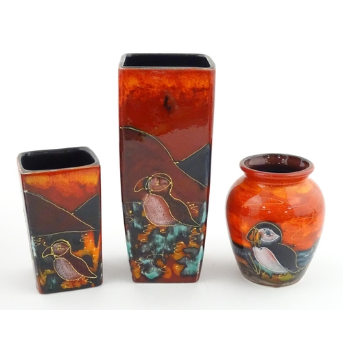 94 - Three Anita Harris studio pottery vases with Puffin decoration. Marked under, two marked Strowgers. ... 