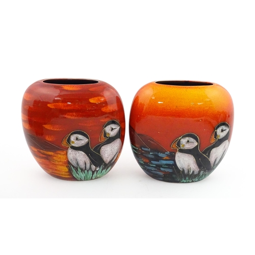 95 - A pair of Anita Harris studio pottery vases with Puffin decoration. Marked under, one marked Trial. ... 