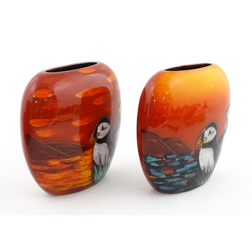 95 - A pair of Anita Harris studio pottery vases with Puffin decoration. Marked under, one marked Trial. ... 