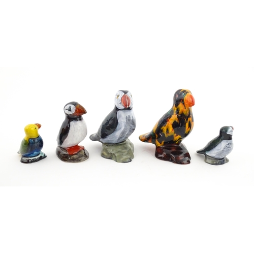 96 - A collection of Anita Harris studio pottery items to include vases and a dish with Puffin decoration... 