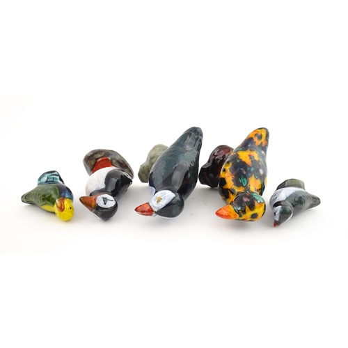 96 - A collection of Anita Harris studio pottery items to include vases and a dish with Puffin decoration... 