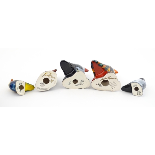 96 - A collection of Anita Harris studio pottery items to include vases and a dish with Puffin decoration... 