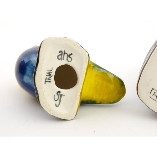 96 - A collection of Anita Harris studio pottery items to include vases and a dish with Puffin decoration... 