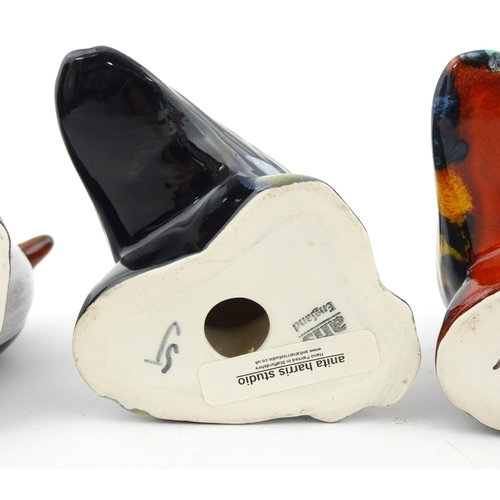 96 - A collection of Anita Harris studio pottery items to include vases and a dish with Puffin decoration... 