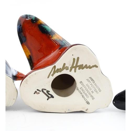 96 - A collection of Anita Harris studio pottery items to include vases and a dish with Puffin decoration... 