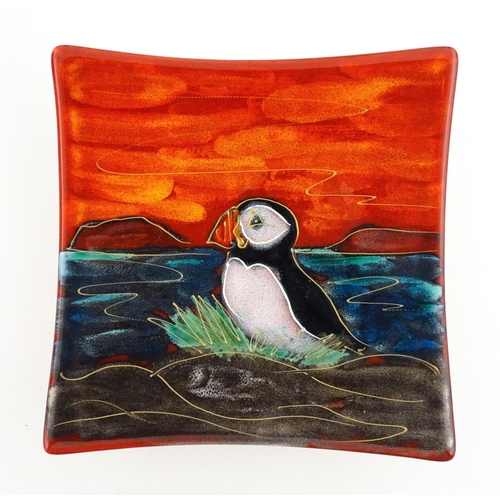 96 - A collection of Anita Harris studio pottery items to include vases and a dish with Puffin decoration... 