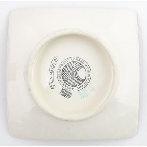 96 - A collection of Anita Harris studio pottery items to include vases and a dish with Puffin decoration... 