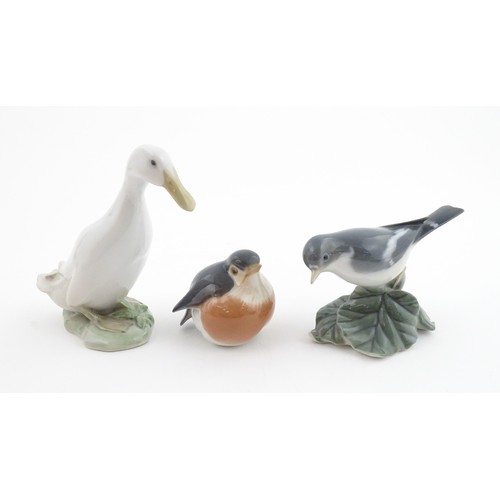 62 - Three Royal Copenhagen models of birds comprising a Duck no. 2122, Robin no. 2266, and Flycatcher no... 
