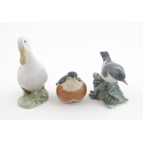 62 - Three Royal Copenhagen models of birds comprising a Duck no. 2122, Robin no. 2266, and Flycatcher no... 