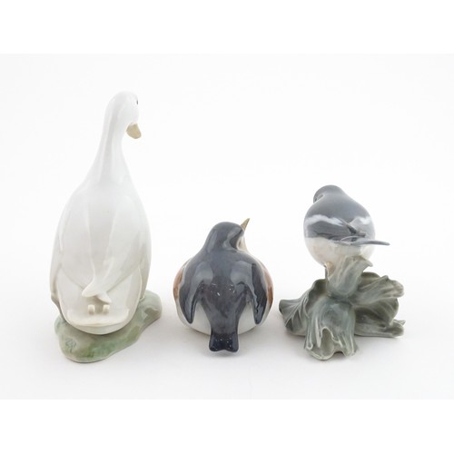 62 - Three Royal Copenhagen models of birds comprising a Duck no. 2122, Robin no. 2266, and Flycatcher no... 