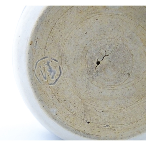 21A - A Chinese blue and white bottle vase with pinch detail decorated with a figure in a landscape. Toget... 