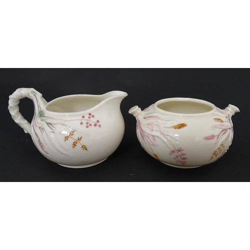 51 - Belleek tea wares in the Grass pattern to include teapots, milk jug, cream jug, teapot stand, saucer... 