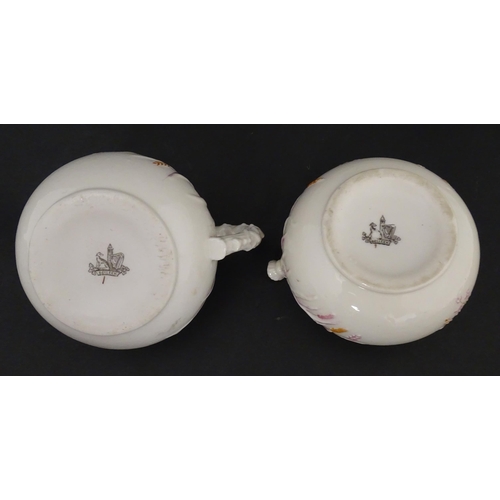 51 - Belleek tea wares in the Grass pattern to include teapots, milk jug, cream jug, teapot stand, saucer... 