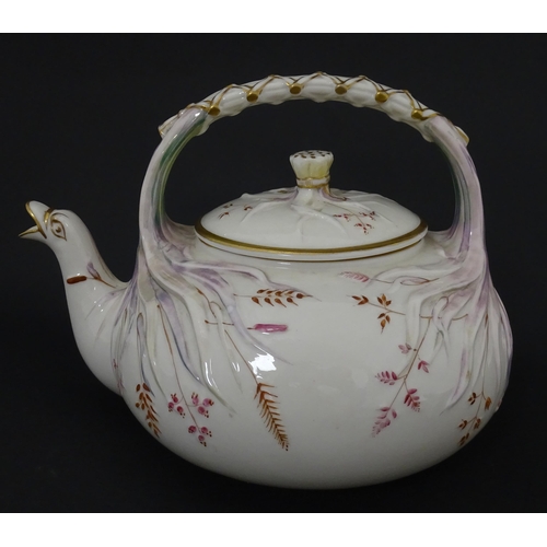 51 - Belleek tea wares in the Grass pattern to include teapots, milk jug, cream jug, teapot stand, saucer... 