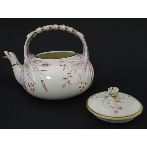 51 - Belleek tea wares in the Grass pattern to include teapots, milk jug, cream jug, teapot stand, saucer... 