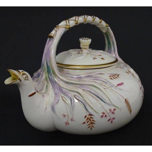 51 - Belleek tea wares in the Grass pattern to include teapots, milk jug, cream jug, teapot stand, saucer... 