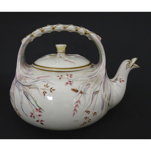 51 - Belleek tea wares in the Grass pattern to include teapots, milk jug, cream jug, teapot stand, saucer... 