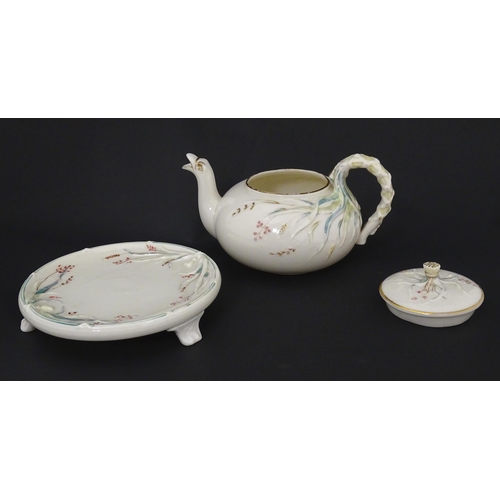 51 - Belleek tea wares in the Grass pattern to include teapots, milk jug, cream jug, teapot stand, saucer... 