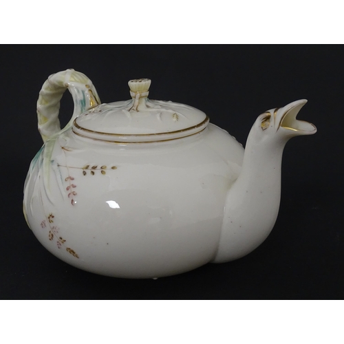 51 - Belleek tea wares in the Grass pattern to include teapots, milk jug, cream jug, teapot stand, saucer... 