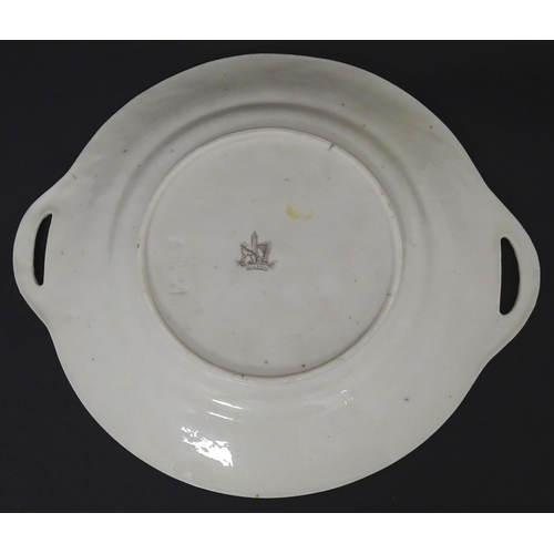 51 - Belleek tea wares in the Grass pattern to include teapots, milk jug, cream jug, teapot stand, saucer... 