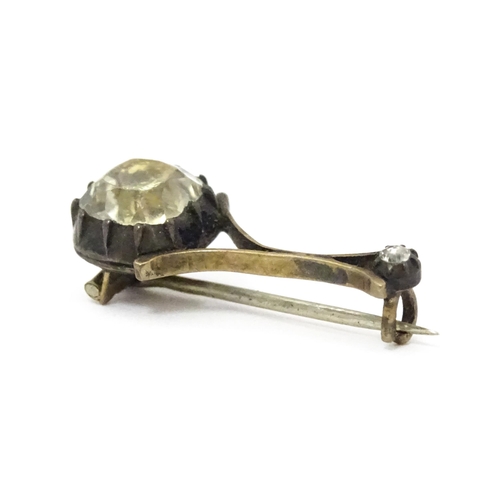 700 - A 19thC commemorative Halley's Comet paste brooch. Approx 7/8