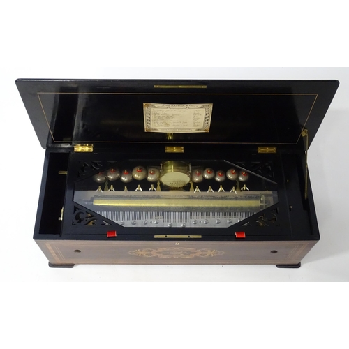 1268 - A 19thC Samuel Troll of Geneva musical box / music box with an unusually long cylinder, with ten eng... 