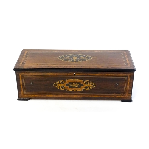 1268 - A 19thC Samuel Troll of Geneva musical box / music box with an unusually long cylinder, with ten eng... 