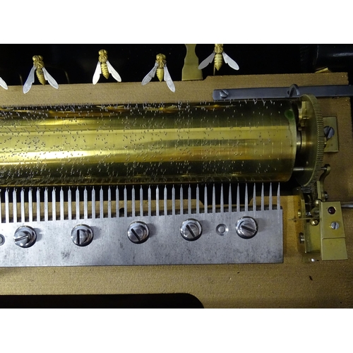 1268 - A 19thC Samuel Troll of Geneva musical box / music box with an unusually long cylinder, with ten eng... 
