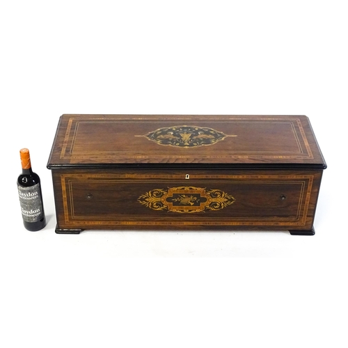 1268 - A 19thC Samuel Troll of Geneva musical box / music box with an unusually long cylinder, with ten eng... 