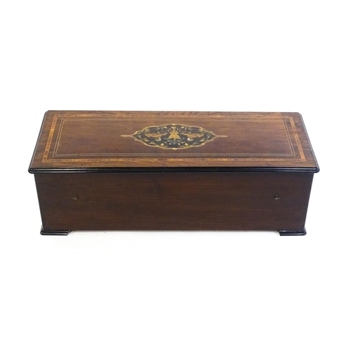 1268 - A 19thC Samuel Troll of Geneva musical box / music box with an unusually long cylinder, with ten eng... 