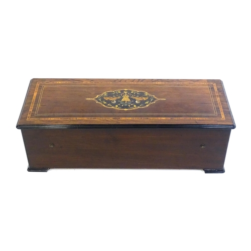 1268 - A 19thC Samuel Troll of Geneva musical box / music box with an unusually long cylinder, with ten eng... 