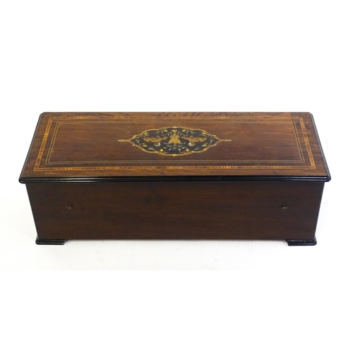 1268 - A 19thC Samuel Troll of Geneva musical box / music box with an unusually long cylinder, with ten eng... 
