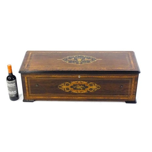 1268 - A 19thC Samuel Troll of Geneva musical box / music box with an unusually long cylinder, with ten eng... 