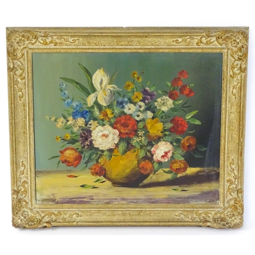 1687 - Toni de Vos, Early 20th century, Oil on canvas, A still life study of flowers in bloom. Signed lower... 